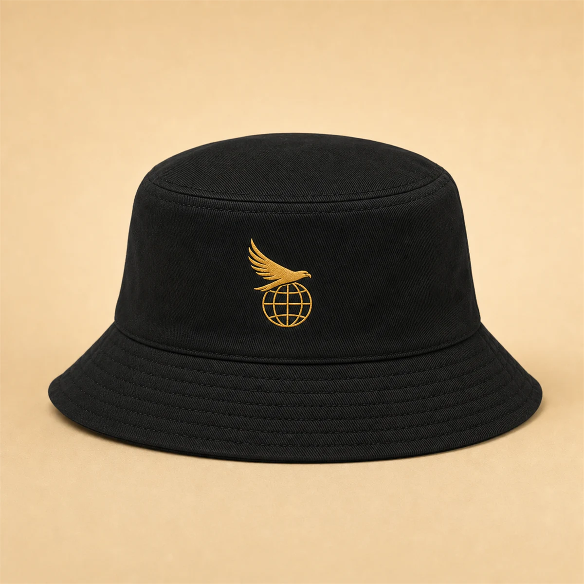 Black bucket hat with the connected Hawk Nest globe and wings mark