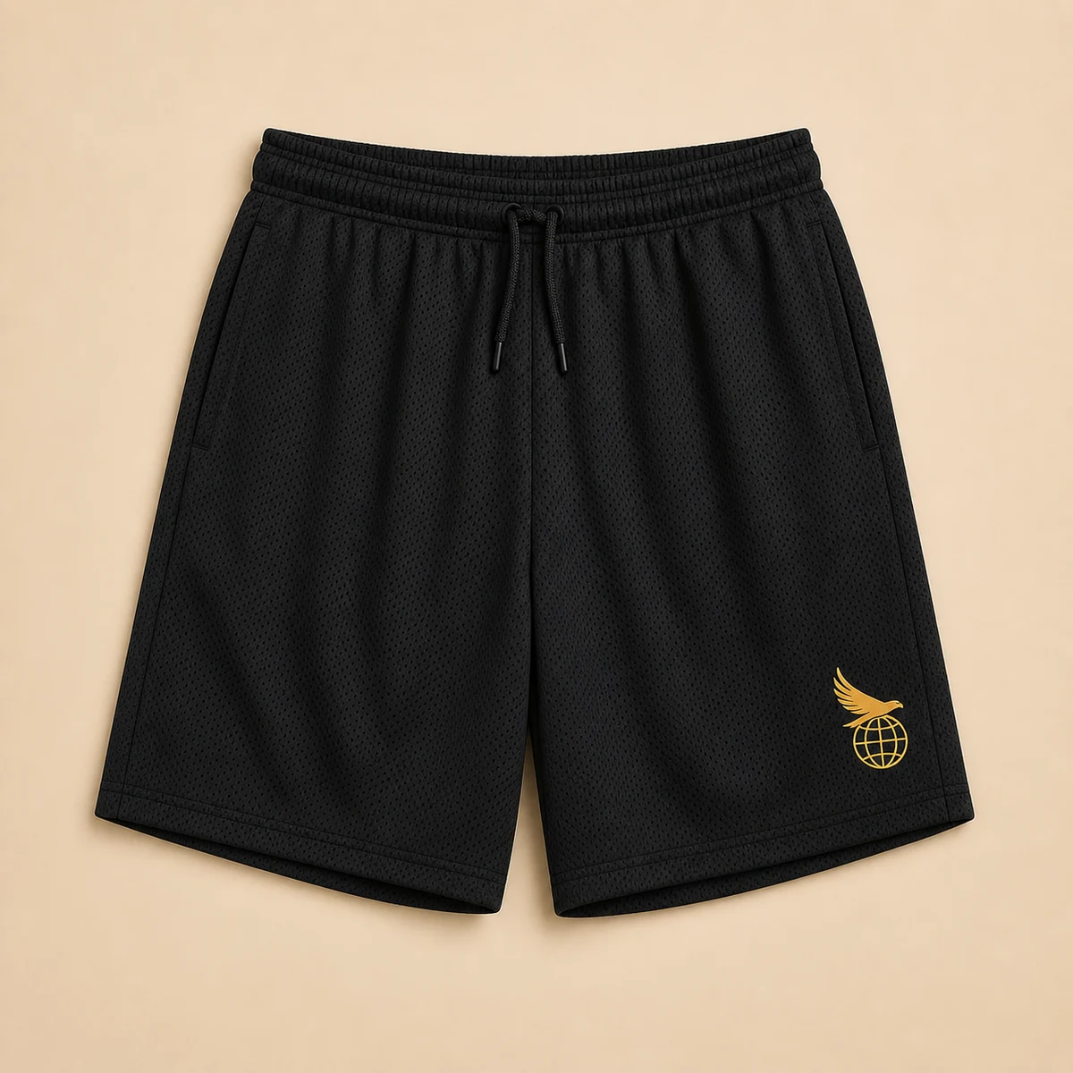 Black and gold Motion Mesh Shorts with the connected Hawk Nest globe-and-wings mark